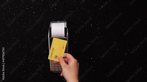 NFC technology. Close-up of using credit card with NFC chip on bank terminal