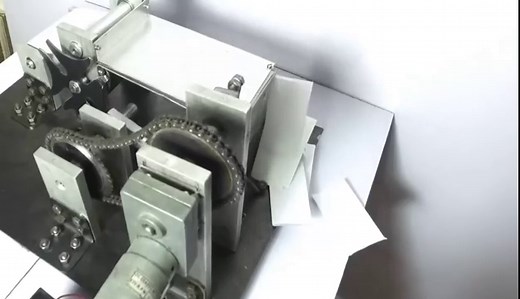 Automatic Paper Cutting Machine Using Geneva Mechanism